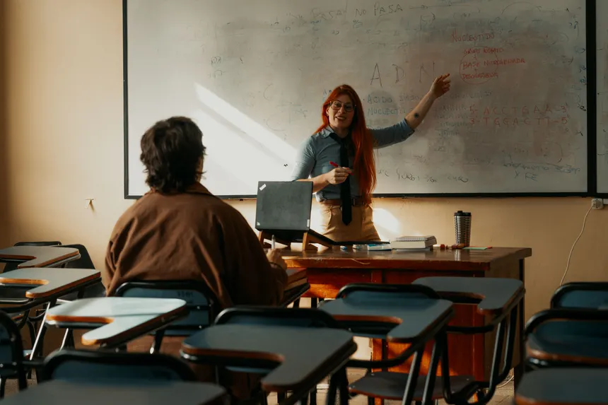 A teacher and student engage in a classroom lecture in Buenos Aires, Argentina.